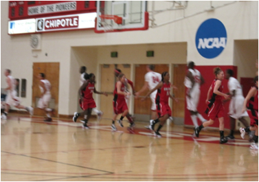 Pioneers basketball players (By: Bethany Helmus)